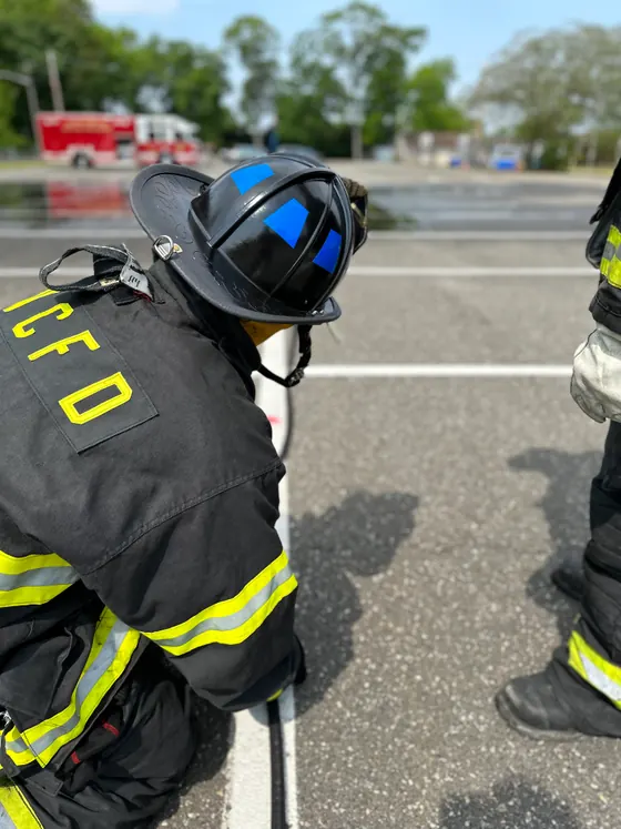 A Woodland member in RVCFD turnout gear during a drill